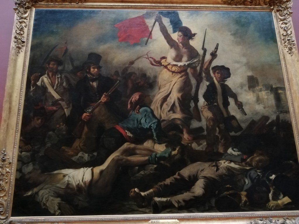 La Libertà che guida il popolo di Delacroix esposta al Louvre, Parigi